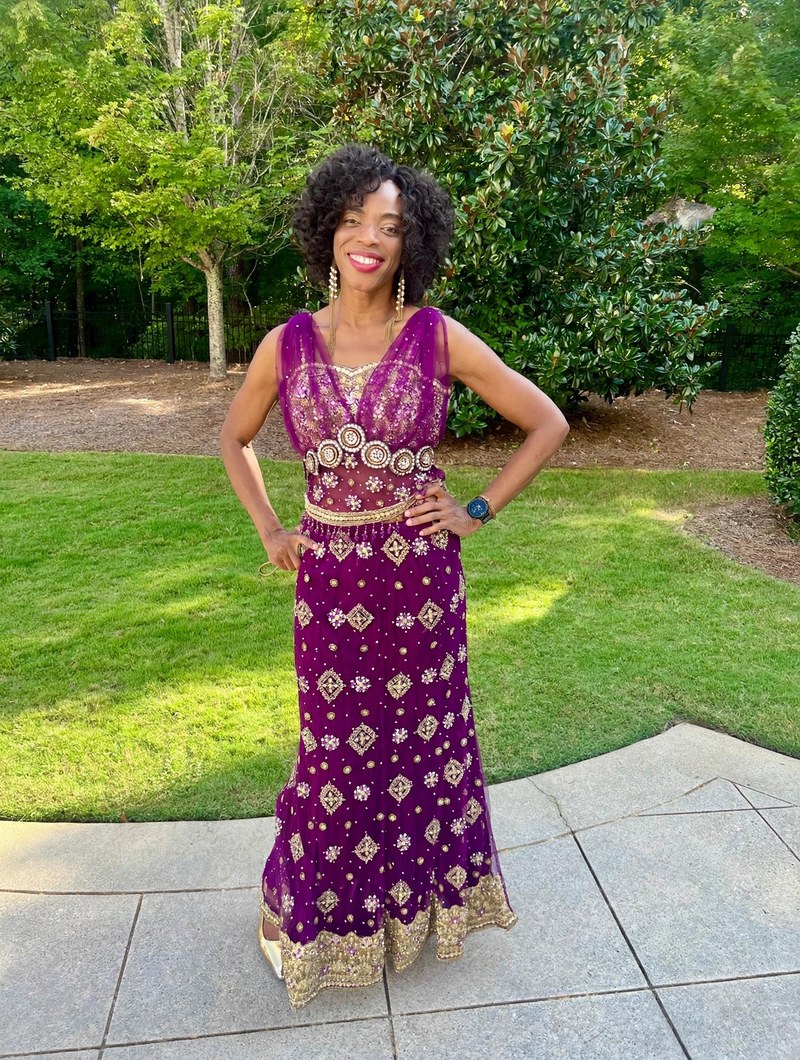 Caroline Irene Jalango in a purple beaded dress